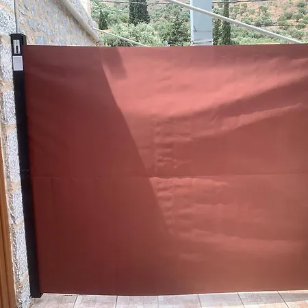 Πετροσπιτο דירה Olimbiaí